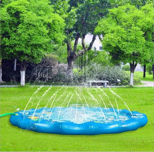 Inflatable sprinkler splash pad spraying water in a garden