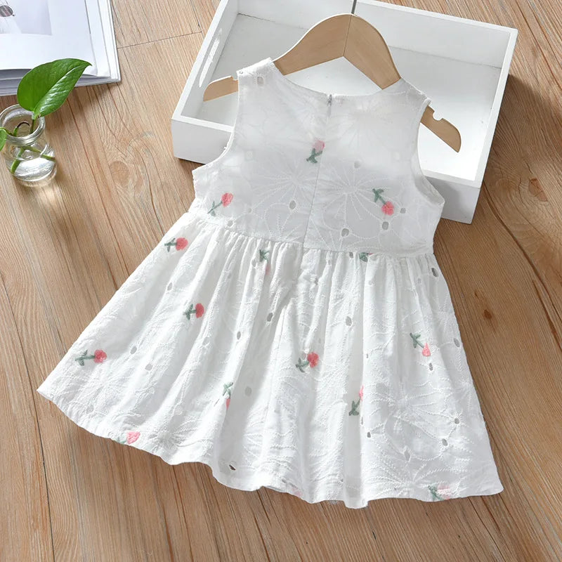 White embroidered floral A-line girls dress on hanger