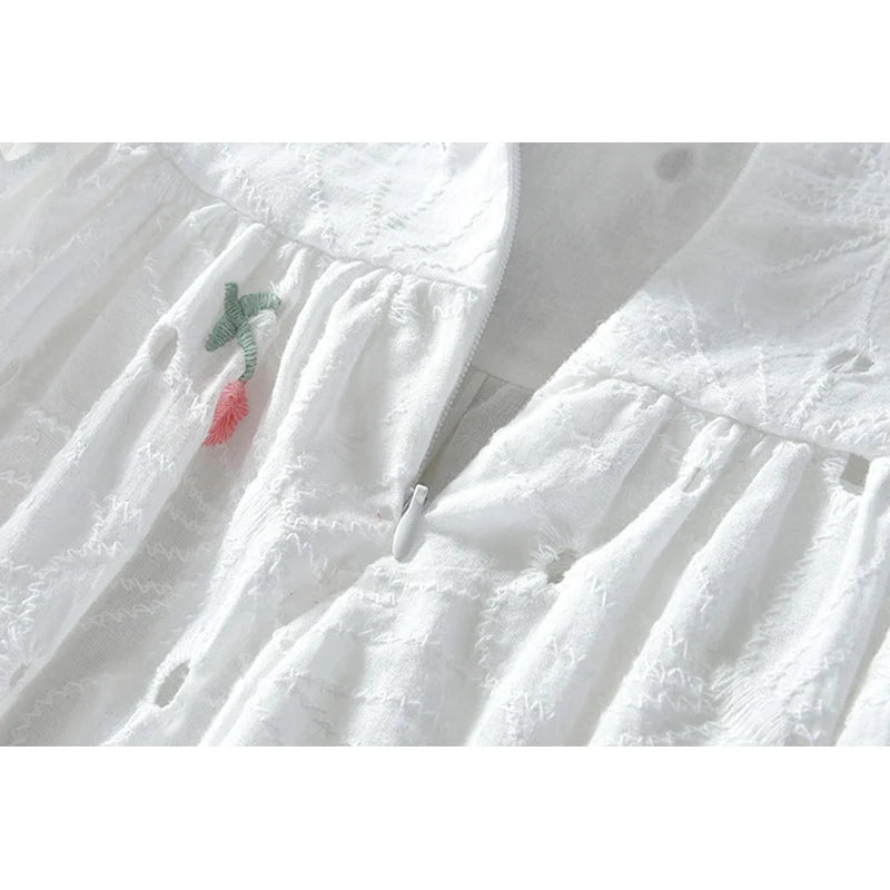 Embroidered cotton dress waist and skirt detail