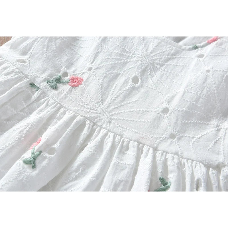 Embroidered floral detail on cotton bodice
