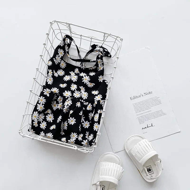 Daisy print girls slip dress in a basket
