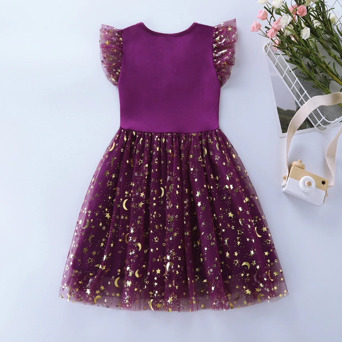 Purple unicorn party dress with flutter petal sleeves