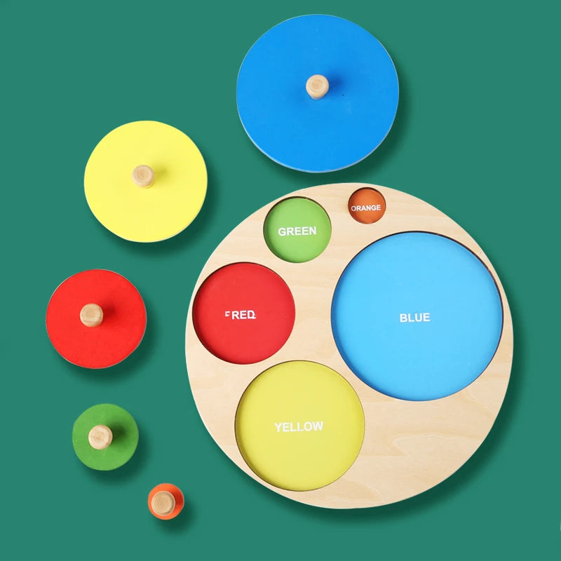 Round wooden colour matching puzzle with green red blue yellow shapes
