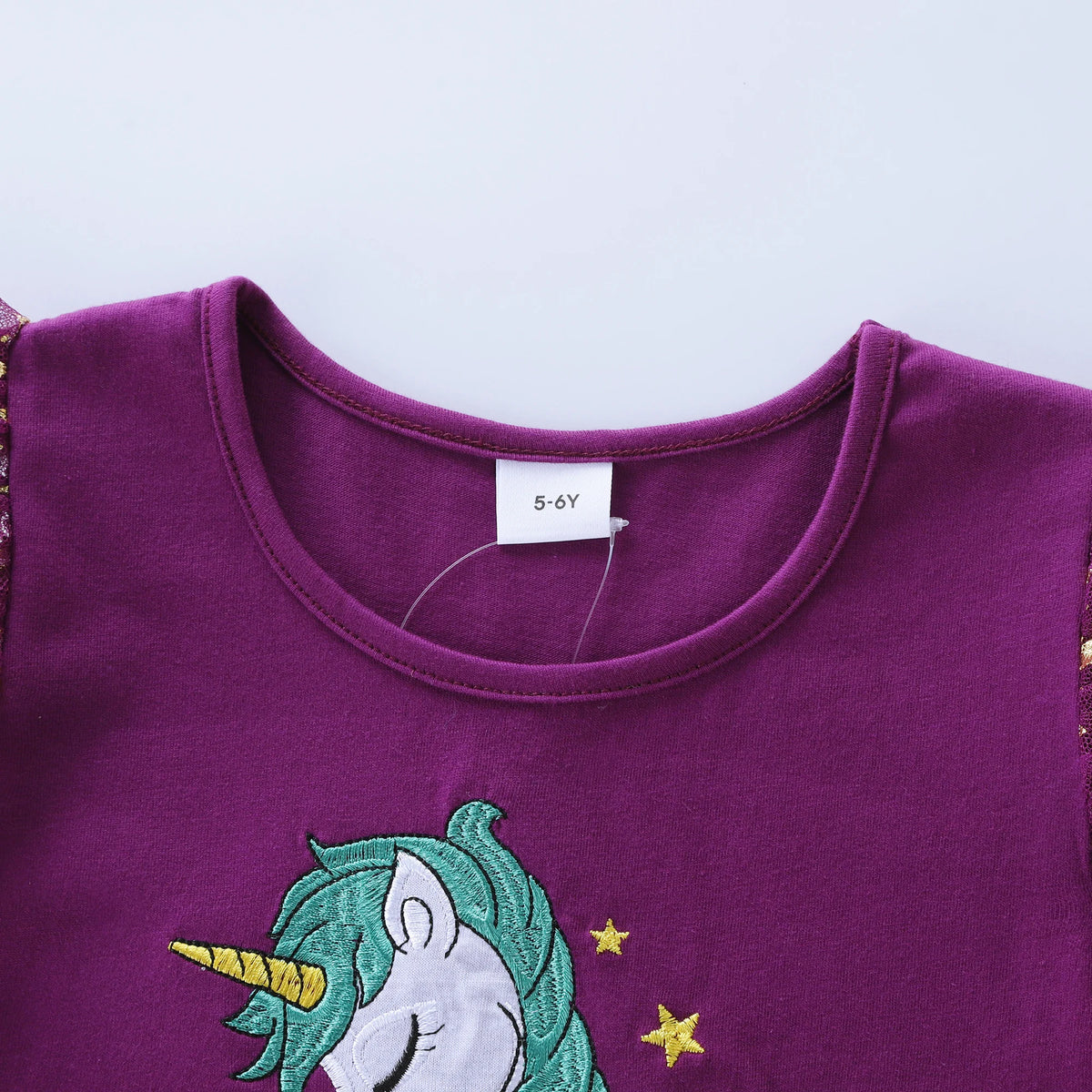 Embroidered unicorn applique on soft cotton bodice