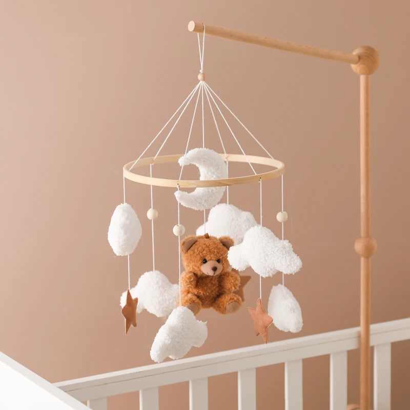 Wooden crib mobile with felt bear and bell for the nursery